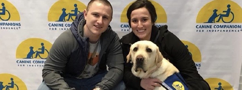 Sam Eaton with her fiance and her dog.
